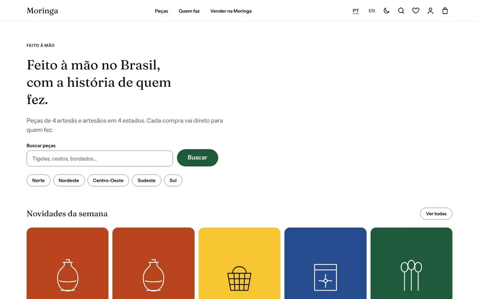 Moringa home page in Portuguese: the headline “Feito à mão no Brasil, com a história de quem fez”, a search field, region filters and new pieces.